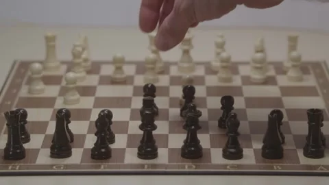 Close-up of a classic chess game being played on a wooden board. Stock Footage 327209197