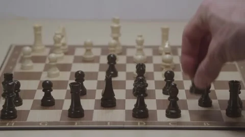 Close-up of a classic chess game being played on a wooden board. Stock Footage 327209626