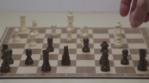 Close-up of a classic chess game being played on a wooden board. Stock Footage 327210297