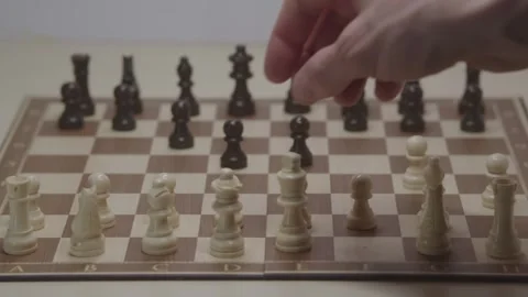 Close-up of a classic chess game being played on a wooden board. Stock Footage 327210819