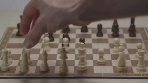 Close-up of a classic chess game being played on a wooden board. Stock Footage 327211021