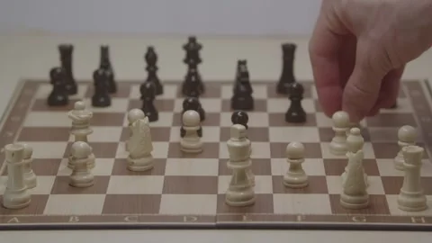 Close-up of a classic chess game being played on a wooden board. Stock Footage 327211270