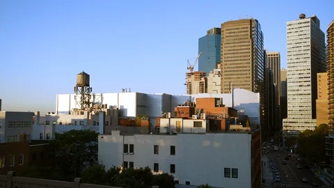 Close-up classic NYC view on buildings with water tower on top 4k Stock Footage 97704548