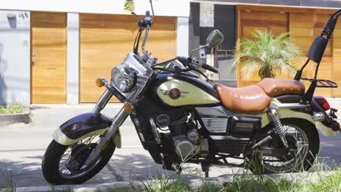 Close-up of a classic Renegade Commando motorcycle parked on the street Stock Footage 150674423