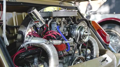 Close Up of Classic Vintage Car Engine with Chrome and Mechanical Parts Stock Footage 320164159