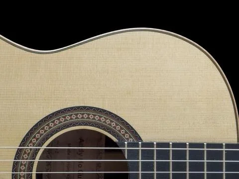 Close up of a Classical Guitar in Black Background Fotos Stock