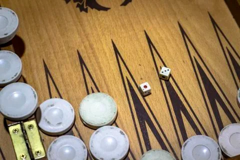 Close-up clean shoot of dice of backgammon under dim light Stock Photos