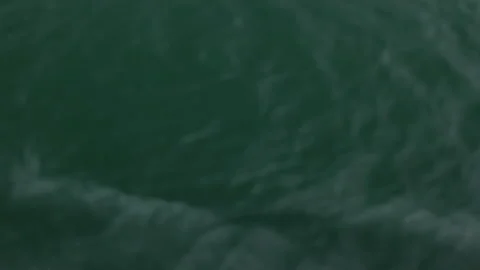Close up of clean water flowing in a small mountain river, slow motion and Stock Footage 231554689