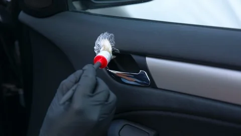 Close up cleaning of interior by a soft brush. 動画素材 114965366