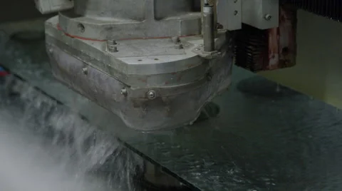 Close up cleaning of pane of glass in factory Stock Footage