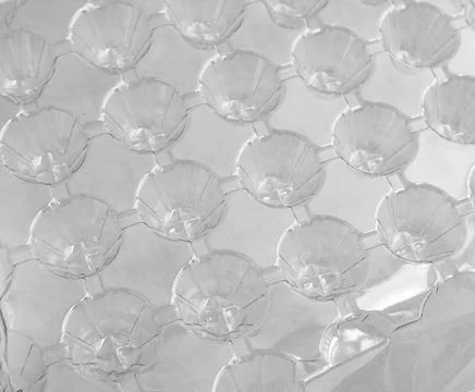 Close up clear plastic egg carton cover isolated on white background. Tray, c Fotos de archivo