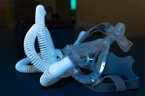 Close up of a clear plastic oxygen mask with adjustable head straps for clini Stock Photos