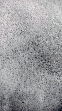 Close-Up of Clear Plastic Pellets  Raw Polymer Granules for Industrial Use Stock Photos