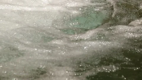 Close up of a clear river flowing rapidly Stock Footage 321325682