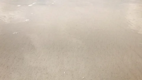 Close up clear surf on white sand Stock Footage 94880182