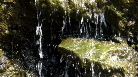Close up of clear waterfall splashing on rocks Stock Footage 321798711