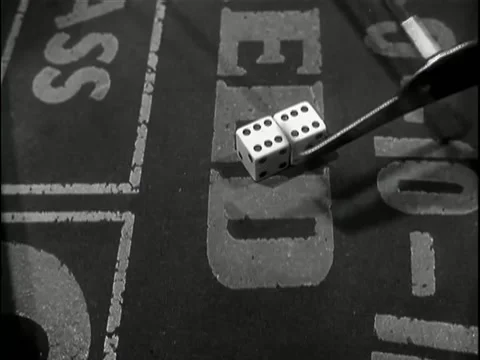 Close-up clearing dice on craps table Stock Footage 260248001