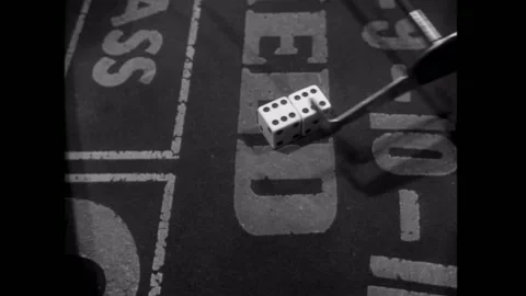 Close-up clearing dice on craps table Stock Footage 260256991