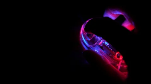 Close up of clicking at a computer mouse with dark background Stock Footage 126765159