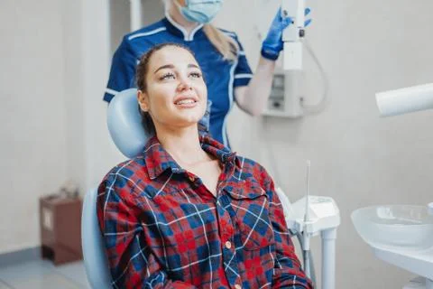 Close up of client smiling while waiting dental check up. Stock Photos