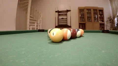 Close up clip of a billiard ball triangle during the break shot, camera on table Stock Footage 46894346