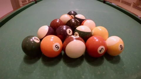 Close up clip of a billiard ball triangle during the break shot Stock Footage 46895776
