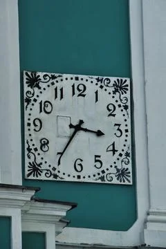 Close-up of a clock on a building. Stock Photos