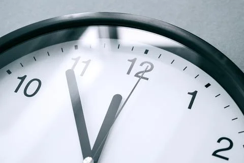 Close-up of clock face or dial with elegance black arrows and numbers Stock Photos