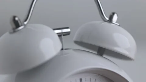 Close up The clock sets the alarm and makes a loud sound to wake it up. Stock Footage 153569829