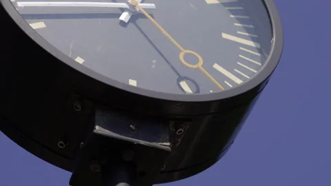 Close-up of the clock at the train station. The second hand moves quickly. Stock Footage 270018141