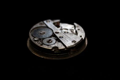 Close-up clockwork on black background Stock Photos
