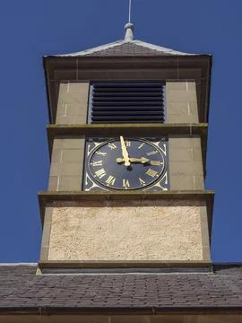 Close-up of the clockwork of a historic building against the blue sky, Lerwick, Stock Photos