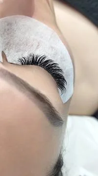 Close up of closed eye with eyelash extensions ,beauty salon treatment Stock Photos