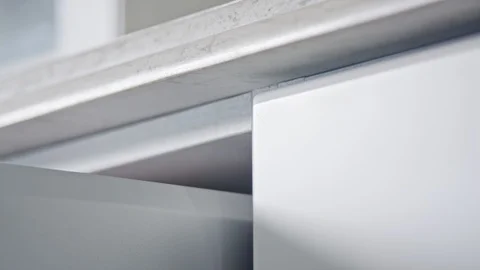 Close up on a closing kitchen drawer Stock Footage 112106890