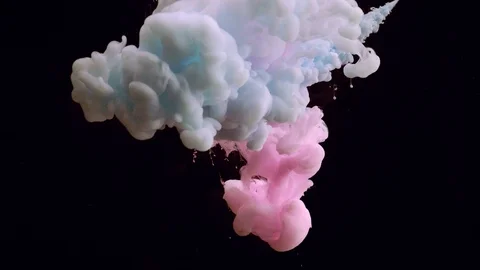 Close-up of a cloud of pink and white and blue paint mixed under water Stock Footage 114319954