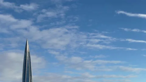 A close up of clouds in the sky with skyscraper Stock Footage 148708026