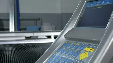 Close-up of the CNC control panel of the machine for metal processing. Many Stock Footage 71644723