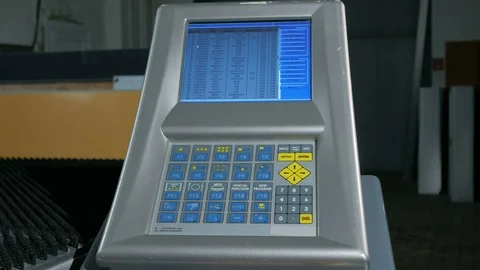 Close-up of the CNC control panel of the machine for metal processing. Many Stock Footage 71645250