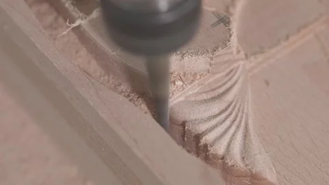 Close-up of CNC machine cutting and shaping a wooden furniture part. Close-up of Vídeo Stock 344989215