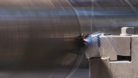 Close up of a CNC machine threading a steel roll. Twisted chips come flying o Stock-Footage 118977637