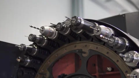 Close-up of CNC Machine Tool Turret Rotating in Modern Industrial Factory Stock Footage 340001023