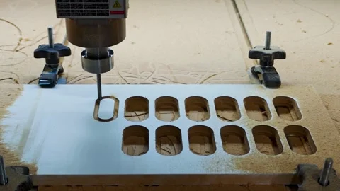 Close up of CNC milling machine spindle carving multiple slots during manuf.. Stock Footage 337246879