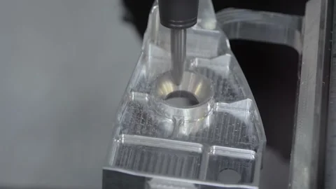 Close up: cnc turning milling machine cutting metal workpiece at factory Stock Footage 170337479