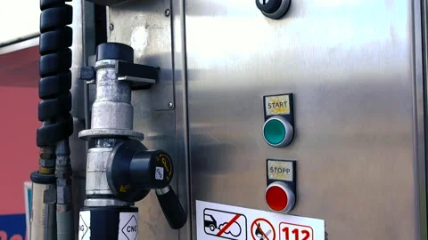 Close Up of CNG Gas Pump Dispenser with Start and Stop Buttons Stock Footage 336536432
