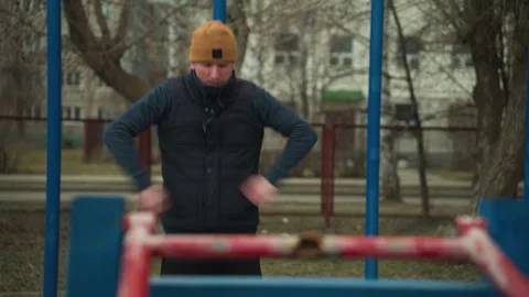 Close-Up of Coach Exercising with Speeding Car and Urban Background Stock Footage 284469417
