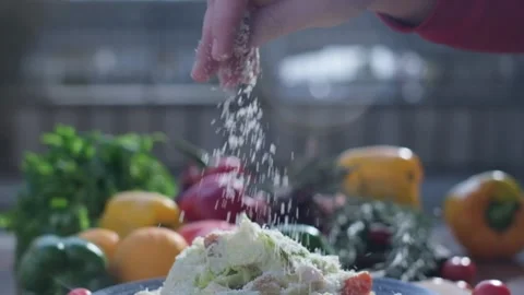 Close-up of coarsely chopped Caesar salad with chicken fillet in the ceramic Vídeos de archivo 204869899