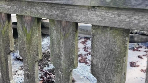 Close-up coastal video capturing aged wooden railing and deck. Stock Footage 333593830