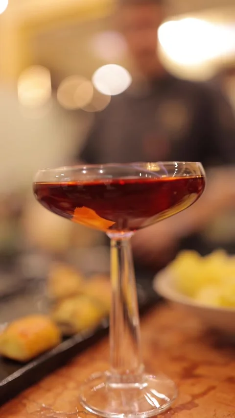 Close up on a cocktail on a bar table Stock Footage 305958093