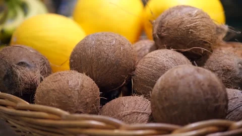 Close up of coconuts stacked on top of each other. Tropical fruits. Stock Footage 311889598