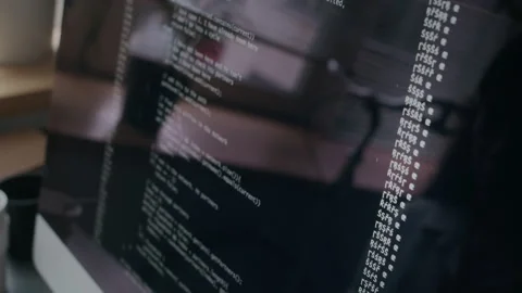Close-Up of Code Running on Computer Screen in Office Stock Footage 306204033